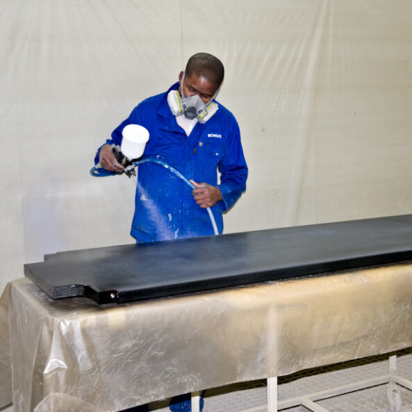 Spray painting of composite products